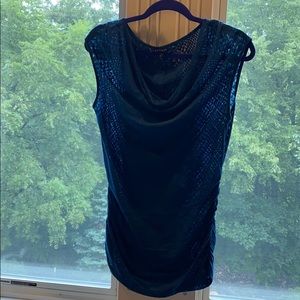 Cowl neck, sleeveless burnout shirt.